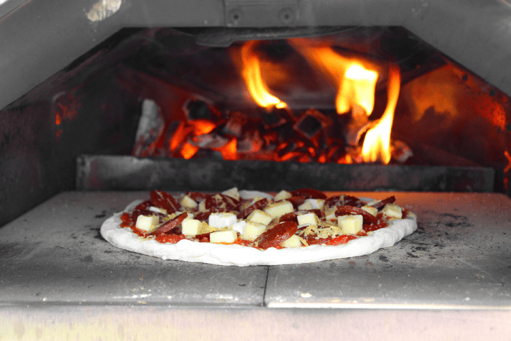 The Secret to Perfect Pizza: Tips for Backyard Oven Cooking